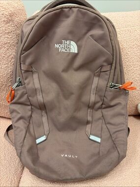 The North Face Vault Backpack in Brown with Orange Zipper Pulls